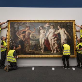 The technical staff hanging the piece for display at CaixaForum Barcelona.