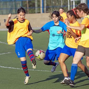 Players from the Asociació Esportiva Ramassà refugee women's team during a match at weekly training.