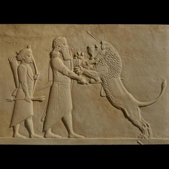 Ashurbanipal killing the lion symbolizes the king's strength and courage.