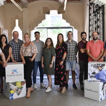 Fotografía de familia de 11 de los project leader de la convocatoria CaixaResearch Validate 2022.