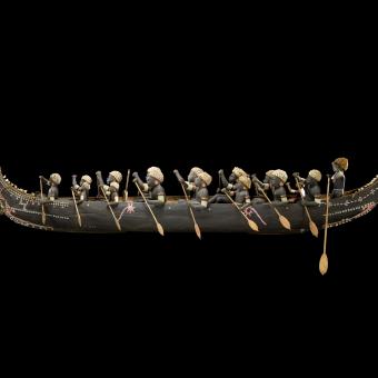 Ango. Model of a tomoko (war canoe) from Roviana, Solomon Islands. 1900-1920. Wood and shell.