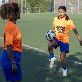 Players from the Ramassà Sports Association's refugee women's team during their training routine.