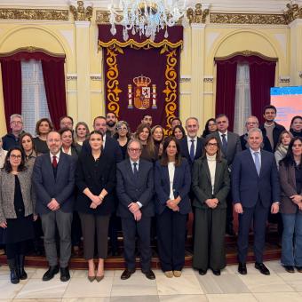 Foto de familia en el acto de presentación del balance anual de la labor social que hace la Fundación ”la Caixa” en Melilla.