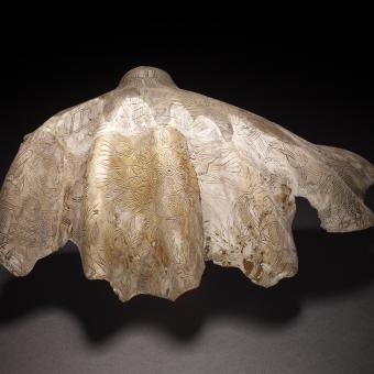 Concha decorada de Tridachna squamosa, utilizada como recipiente de cosméticos , 800-600 a. de C., Sippar (Irak). 1882,0918.14352.