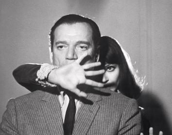 Eddie Constantine y Anna Karina en Lemmy contra Alphaville, 1966.