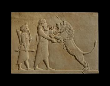 Asurbanipal matando al león simboliza la fuerza y el valor del rey.