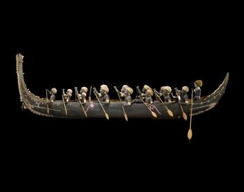 Ango. Model of a tomoko (war canoe) from Roviana, Solomon Islands. 1900-1920. Wood and shell.