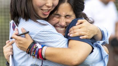Shagufa (player) and Maria (coach) hug each other during the final training session and farewell of the season.
