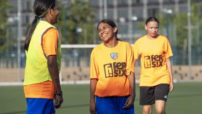 Relaxed moments during training for the refugee women's team from the Ramassà Sports Association.
