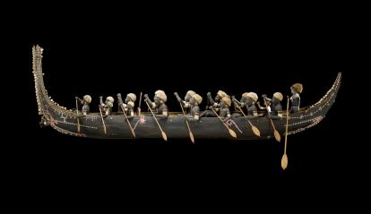 Ango. Model of a tomoko (war canoe) from Roviana, Solomon Islands. 1900-1920. Wood and shell.