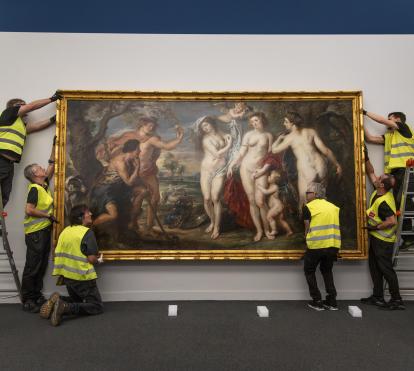 The technical staff hanging the piece for display at CaixaForum Barcelona.