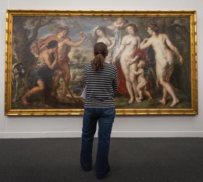 A visitor admires Rubens' painting "The Judgment of Paris" at CaixaForum Barcelona.
