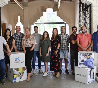 Fotografía de familia de 11 de los project leader de la convocatoria CaixaResearch Validate 2022.