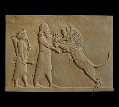 Ashurbanipal killing the lion symbolizes the king's strength and courage.