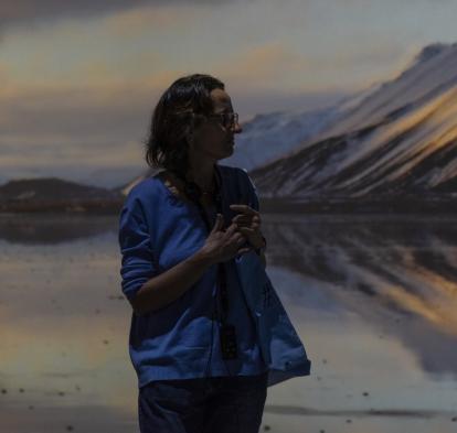 Inma admiring one of the immersive experiences at the "Root for Nature" exhibition at CaixaForum Barcelona.